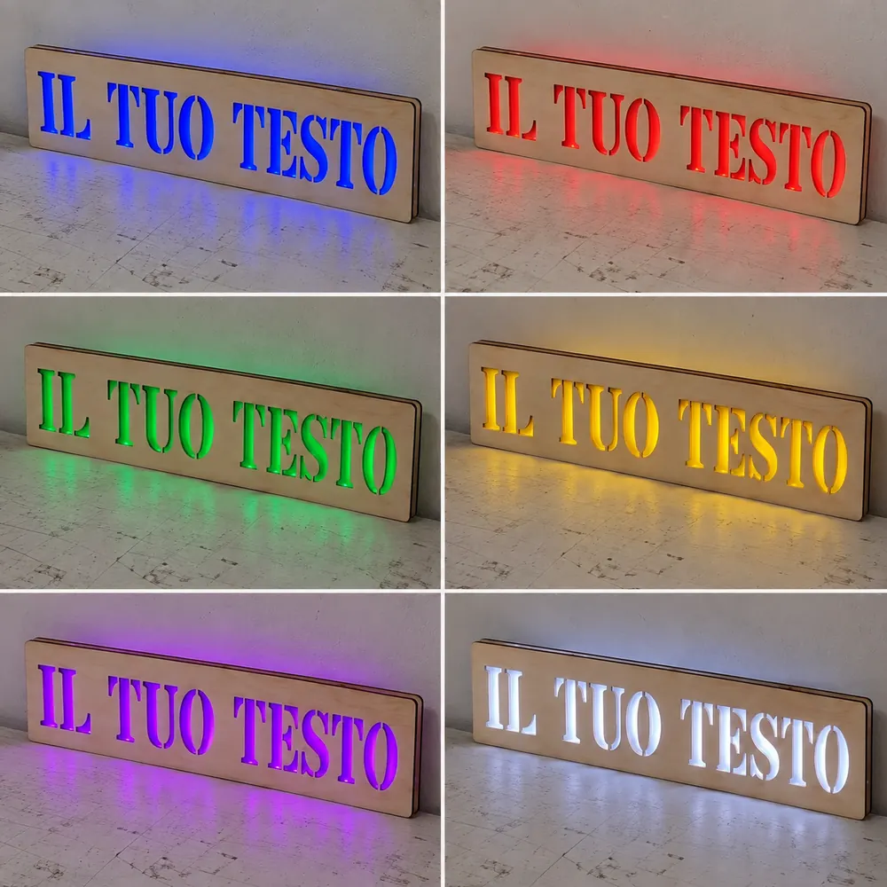 Dettaglio illustrativo della scritta intagliata e illuminata su legno naturale